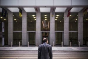 Man walking towards office building